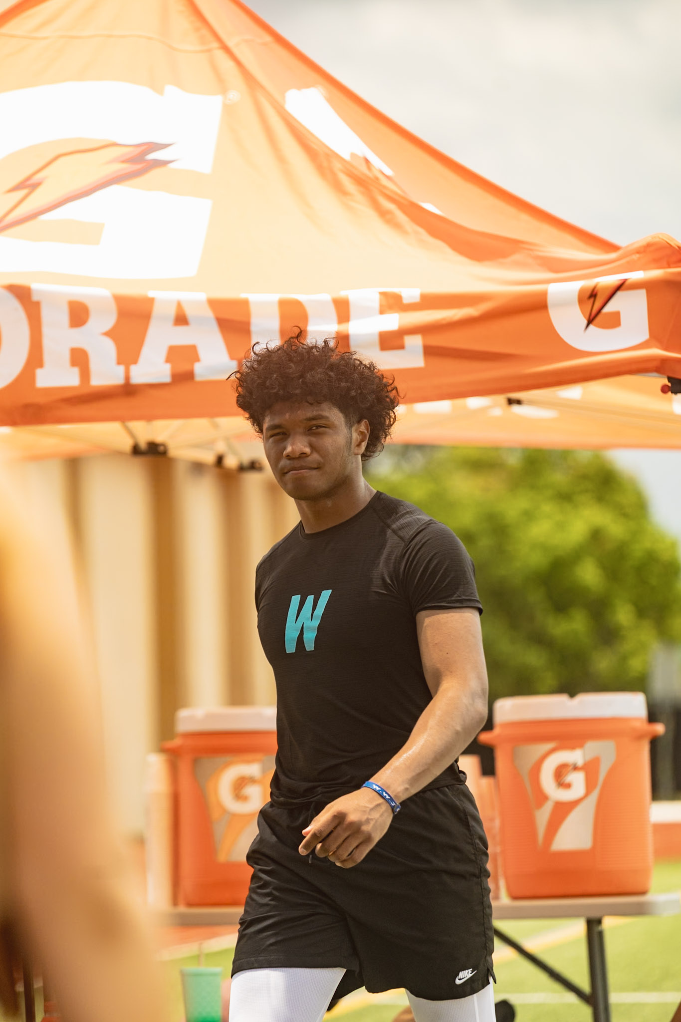 WeTrain trainer at the camp sponsor area between sessions